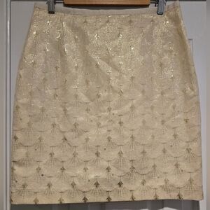 NWT women's H&M shiny gold mini skirt lined Size 12
